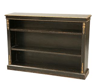 A VICTORIAN ORMOLU-MOUNTED EBONISED OPEN BOOKCASE, the top with gilt-highli
