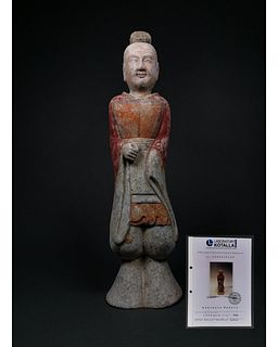 A PAINTED GREY POTTERY FIGURE OF AN ATTENDANT