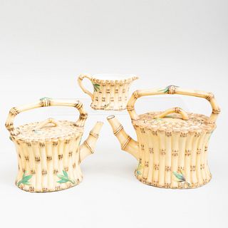 Two Wedgwood Faux Bamboo Porcelain Teapots and a Cream Jug