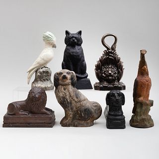 Group of Five English and American Cast Iron Doorstops, a Dog Form Boot Scraper, and a Camel Form Shoe Shine Stand