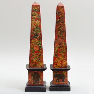 Pair of Decalcomania Decorated Red Painted Stone Obelisks 