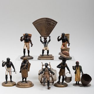 Group of Eight Cold Painted Nubian Table Ornaments