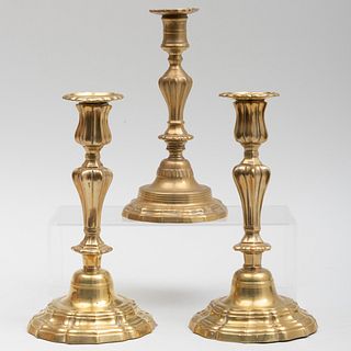 Pair of Louis XIV Style Brass Candlesticks and Another Brass Candlestick