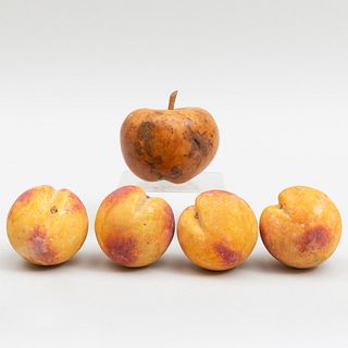 Group of Four Painted Stone Models of Peaches and a Model of a Burlwood Apple