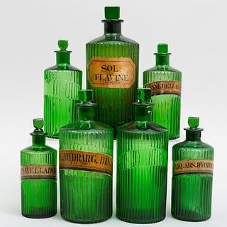 Group of Seven French Green Glass Apothecary Jars with Paper Labels