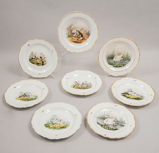 Juego de platos decorativos. Alemania. S.XX. En porcelana Meissen. Decorados con escenas zoomorfas. 20 cm (diámetro). Total 8.