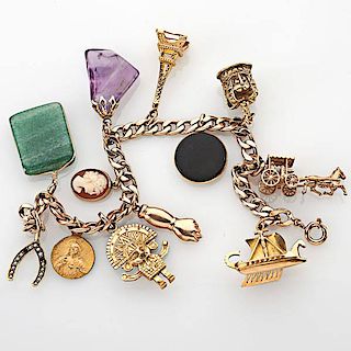 GOLD BRACELET WITH CHARMS