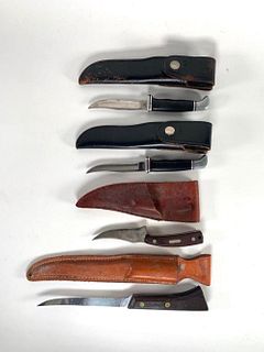 Four Vintage Buck, Fillet and Skinning Knives