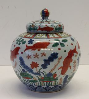 Chinese Enamel Decorated Porcelain Liddeed Jar.