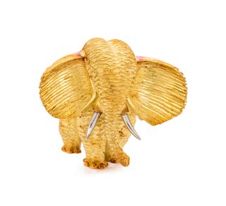 HENRY DUNAY, YELLOW GOLD AND PLATINUM ELEPHANT BROOCH