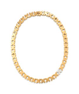 TIFFANY & CO., YELLOW GOLD AND DIAMOND 'X' NECKLACE