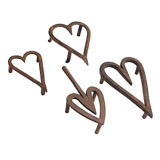 Collection of Early Wrought-iron Heart Trivets