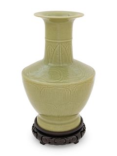 A Celadon Glazed Incised VaseHeight 11 1/4 in., 28.6 cm.