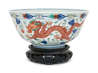 A Wucai 'Dragon and Phoenix' Porcelain BowlDiam 6 1/8 in., 15.5 cm.
