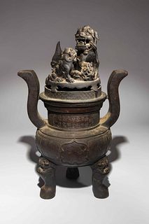 A Bronze Tripod Incense Burner and CoverHeight 16 in., 40.6 cm.