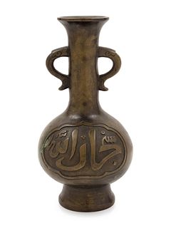 A Bronze Vase
Height 8 in., 20.3 cm. 
