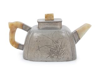 An Yixing Pewter-Encased TeapotHeight 3 1/4 in., 8 cm.