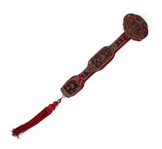 A Reticulated Sandalwood Ruyi Scepter
Length 19 in., 48.3 cm.