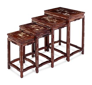 A Set of Four Hardwood Nesting TablesHeight 26 in., 66 cm.