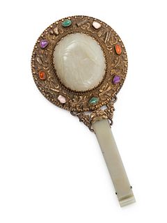 A Jade and Hardstone Embellished Gilt Metal Hand Mirror
Height 9 in., 22.9 cm.