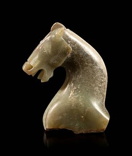 A Calcified Grey Jade Head of a Horse
Height 4 1/8 in., 21.1 cm. 