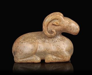 A Calcified Jade Figure of a Ram
Length 3 1/4 in., 8.3 cm.