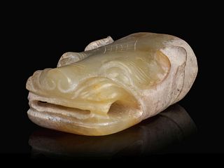 A White Jade Head of a Dragon
Length 1 3/4 in., 4.4 cm.