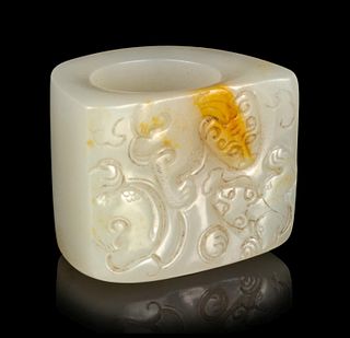 A White Jade Archer's Ring
Diam. interior 7/8 in., 2.2 cm.