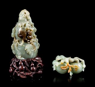 Two Celadon and Russet Jade Articles
Height of taller 5 in., 12.7 cm. 