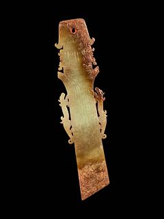 A Russet and Yellow Jade Zhang
Length 9 3/4 in., 24.8 cm. 