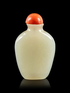 A Small White Jade Snuff BottleHeight of bottle 2 in., 5 cm.