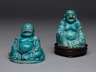 Two Turquoise Glazed Porcelain Figures of Budai BuddhasHeight of taller 3 in., 7.6 cm.