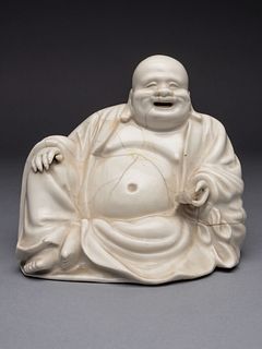 A Blanc-de-Chine Porcelain Figure of Budhai BuddhaHeight 6 in., 15.2 cm.