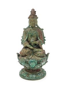 A Bronze Figure of Guanyin
Height 8 1/4 in., 21 cm.