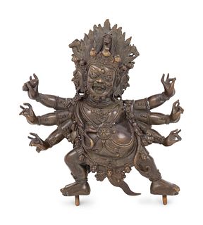 A Sino-Tibetan Bronze Figure
Height 8 1/4 in., 21 cm.