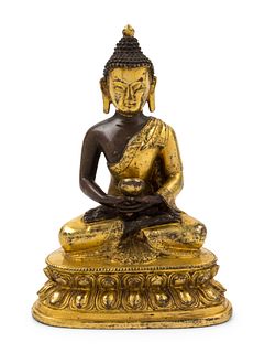 A Sino-Tibetan Gilt Bronze Figure of Medicine Buddha
Height 6 1/4 in., 16 cm. 