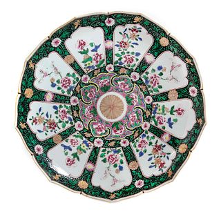 A Japanese Polychrome Enameled Porcelain Flori-Form Plate
Diam 15 3/4 in., 40 cm.