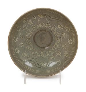 A Korean Slip Decorated Celadon Glazed Porcelain Bowl 
19TH CENTURY