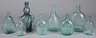Historical aquamarine glass bottles and flasks