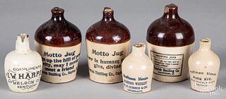 Six miniature stoneware advertising jugs