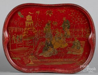 Two red toleware trays, 19th c.