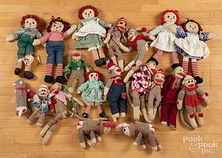 Group of Raggedy Anne/Andy dolls and sock monkeys