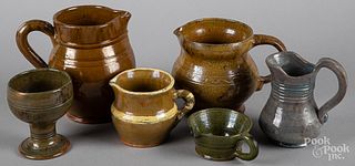 Six pieces of Stahl redware