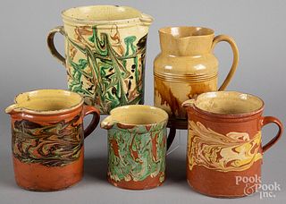 Five French redware pitchers