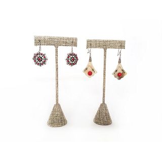 TWO PAIRS OF EARRINGS WITH RED STONES