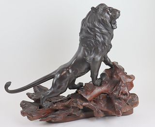 Japanese Bronze Of A Lion On Wood Stand .