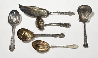 Six sterling serving spoons
