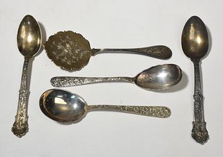 Five sterling silver serving spoons