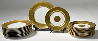 Two sets of gold rimmed porcelain plates
