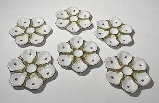 Set of six porcelain oyster plates